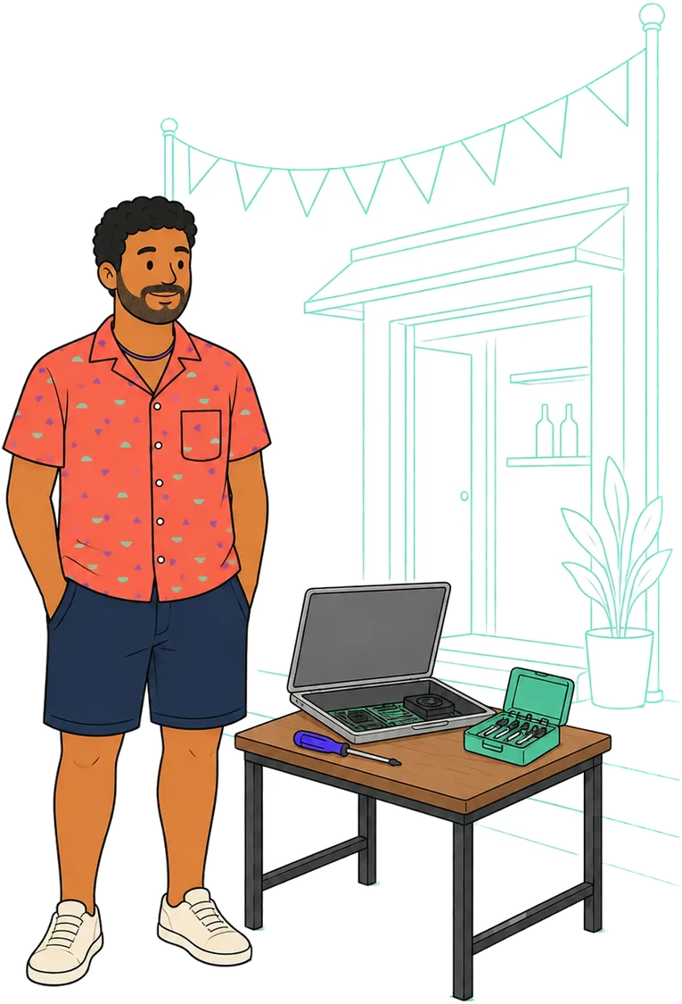 Rubens, técnico de informática, ao lado da bancada de trabalho